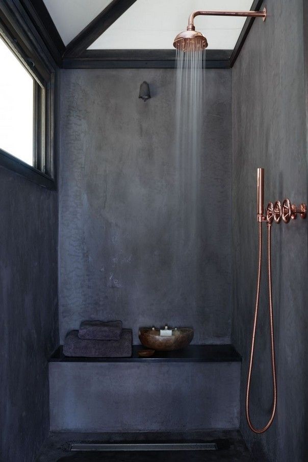 Bathroom with rose gold fixtures and dark grey walls