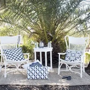 Joshua Rattan Sun Chair - White outdoors