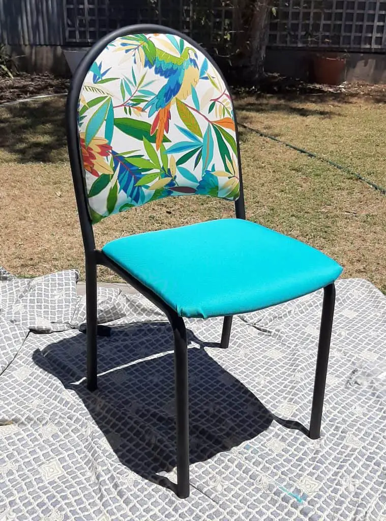 Finished chair upcycle. New fabric and painted black frame. Front view