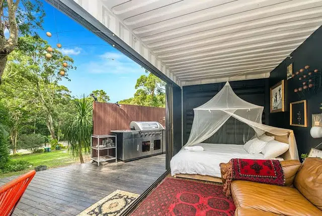 20ft Container House - living roomt elevation with living room opens on to stepped verandah