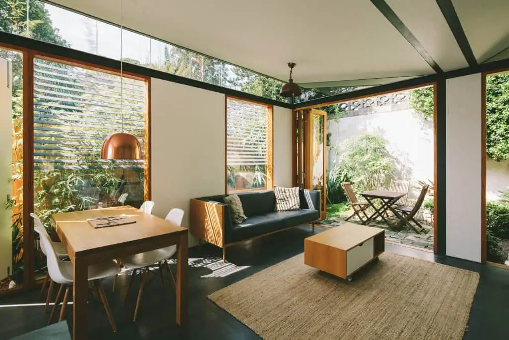 Copper House open plan living and dining room with lots of natural light opening on to garden