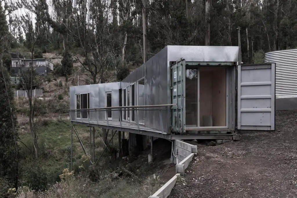 House 28 front elevation showing how containers are raised on stilts