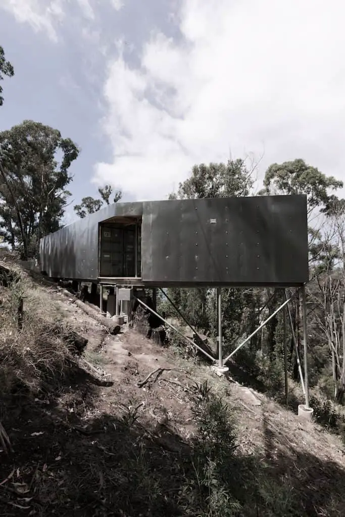 House 28 container house raised high on stilts.