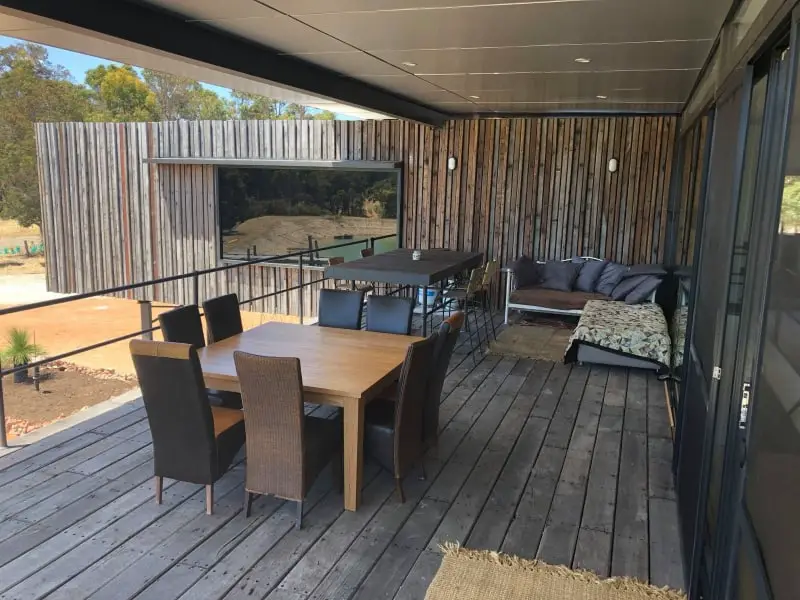 Kaloorup large deck area provides additional dining and living spaces outdoors