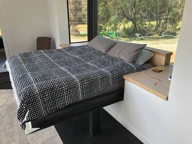 Kaloorup bedroom with bed built in to box window