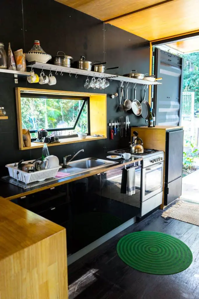 Off-grid container home compact kitchen