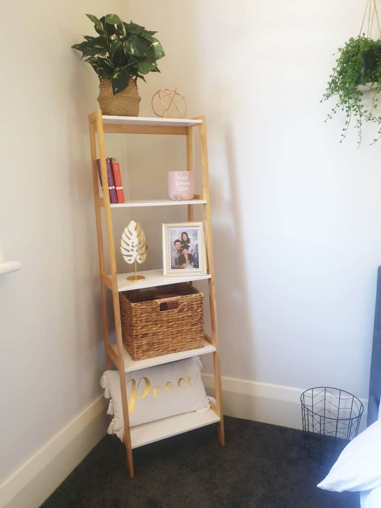 DIY bedroom makeover bookshelf with sophisticated accessories