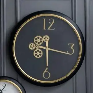 Black and gold wall clock with exposed mechanics