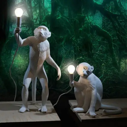 Monkey Resin Lamp standing and sitting. Bulb is placed in monkeys hands.