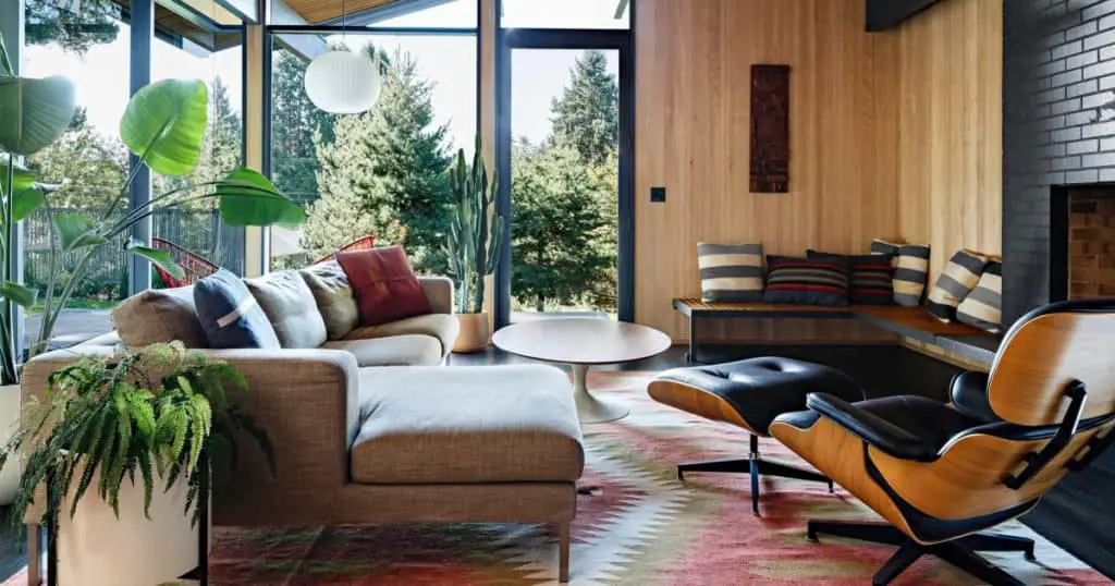 Living room with wood paneling. 70s revival interior design