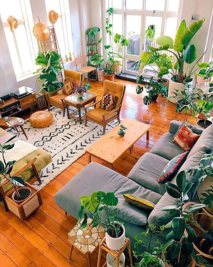 Connection to nature. Bringing the outside inside. Indoor plants, ,earthy colours, natural textures help to create this cozy 2021 interior design trend.