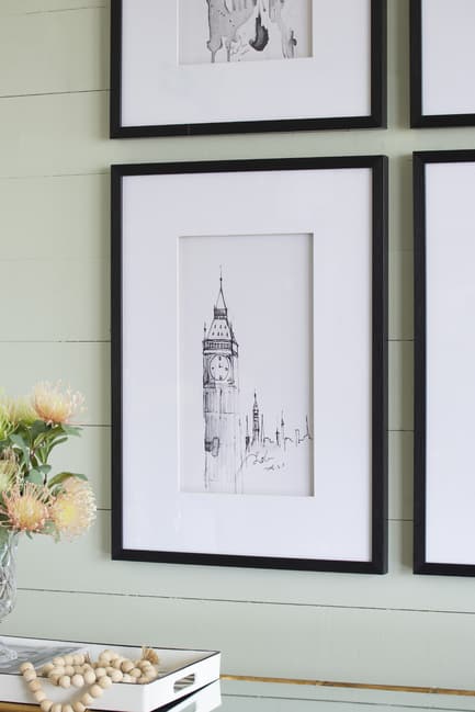 Set of 4 Steeple building prints close up of print on wall