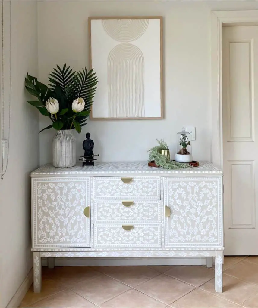 Vintage sideboard makeover. Bone inlay effect using stencils and paint.