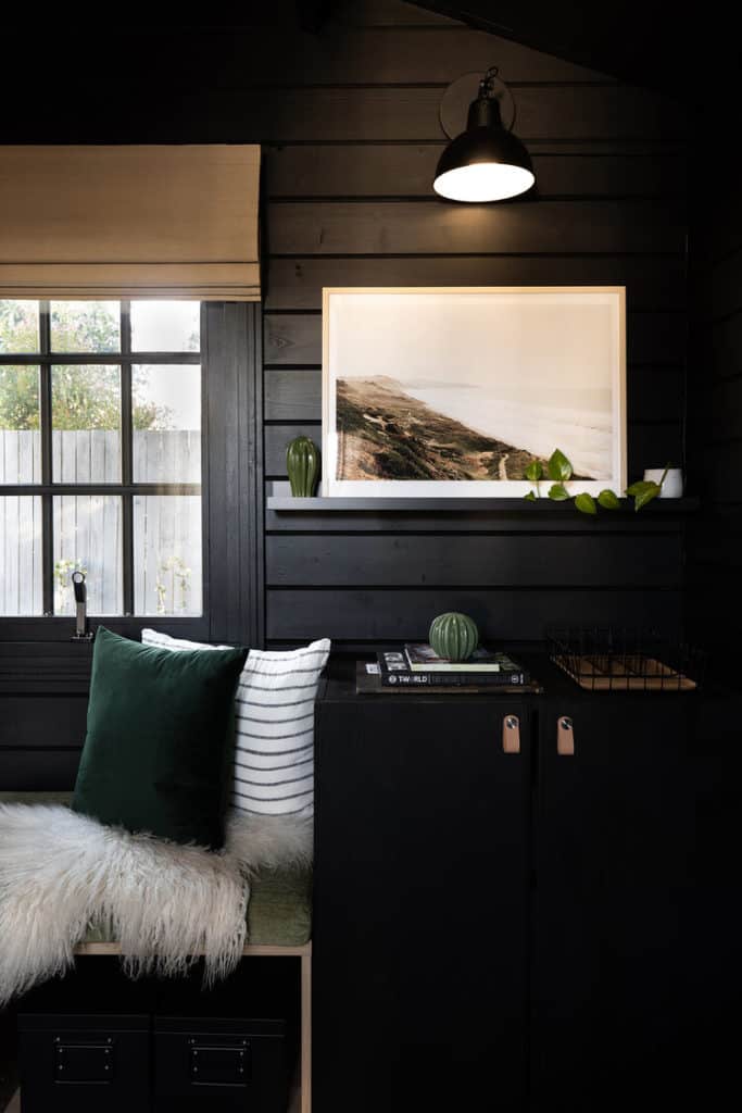 Mark's Studio Shed interior with picture shelf, sideboard and bench seat